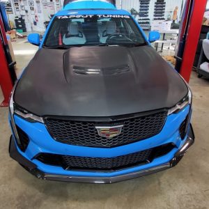 Unpainted fiberglass hood with vents