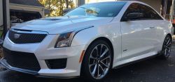 ATS-V performance white coupe