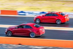 red ATS-V drag race
