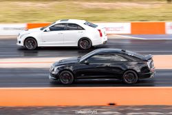Black and white ATS-V drag race